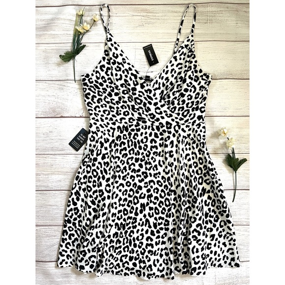 Express Dresses & Skirts - Express V-Neck Animal Print Mini Dress